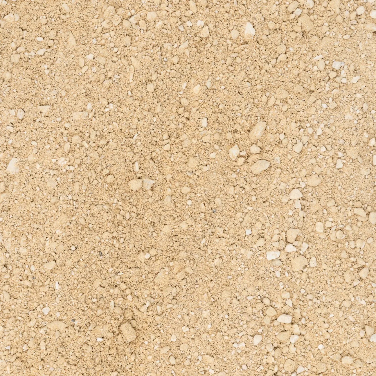 קלוז אפ של מצע לדשא סינטטי ברקע של חצץ וסומסום