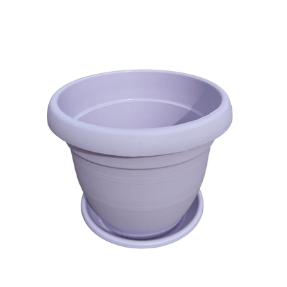 Purple pot with saucer on a white background