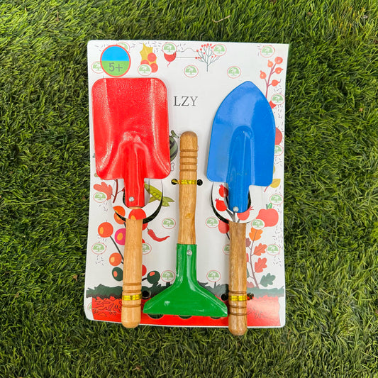 Set of children's gardening tools on a branded card with grass background