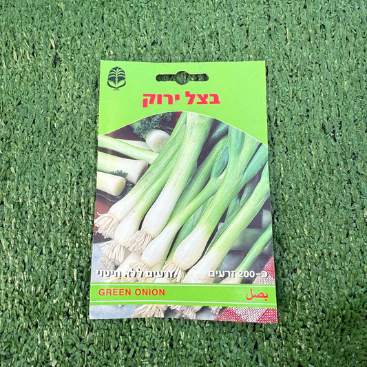 Green onion seed packet on a green textured background