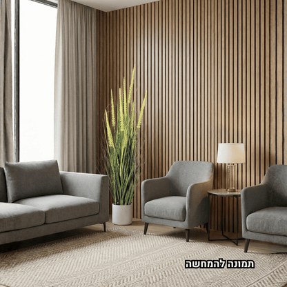 artifical plant in a white pot in a modern office setting with gray furniture and large windows.